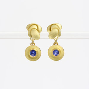 18 carat gold triple oval earstuds with round drop with facetted tanzanites